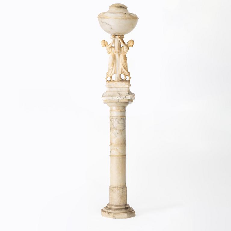 A lamp on a pedestal, early 20th Century.