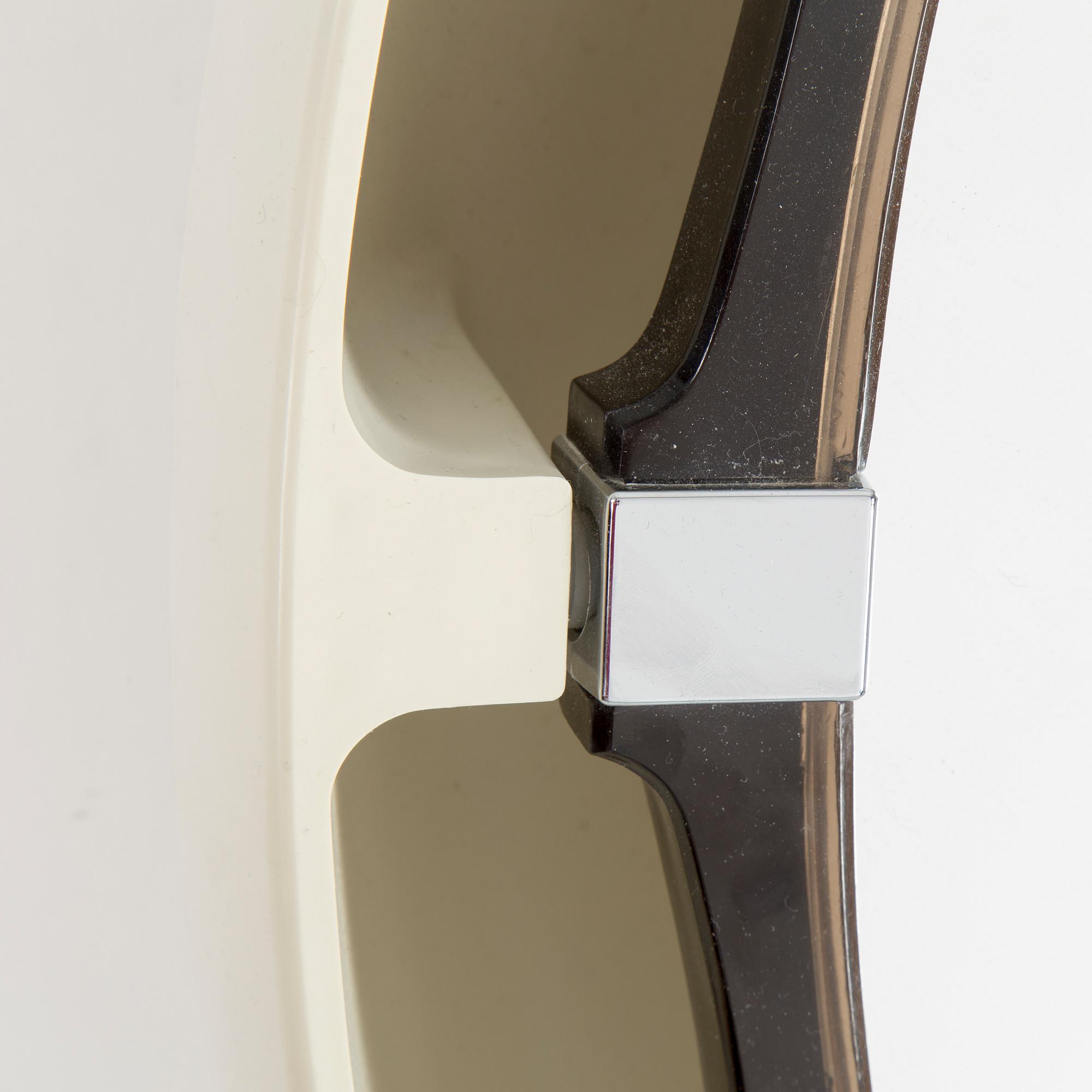 A "SPACE AGE" WALL MIRROR WITH LIGHT BY ALLIBERT, 1970s.