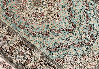 An Oriental silk rug, approx. 154 x 91 cm.