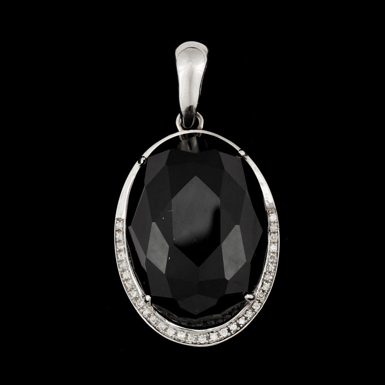 HÄNGE, 14k vitguld, fasettslipad opak svart sten, samt briljantslipade diamanter tot ca0,30ct. 2000-tal. Vikt 16g.