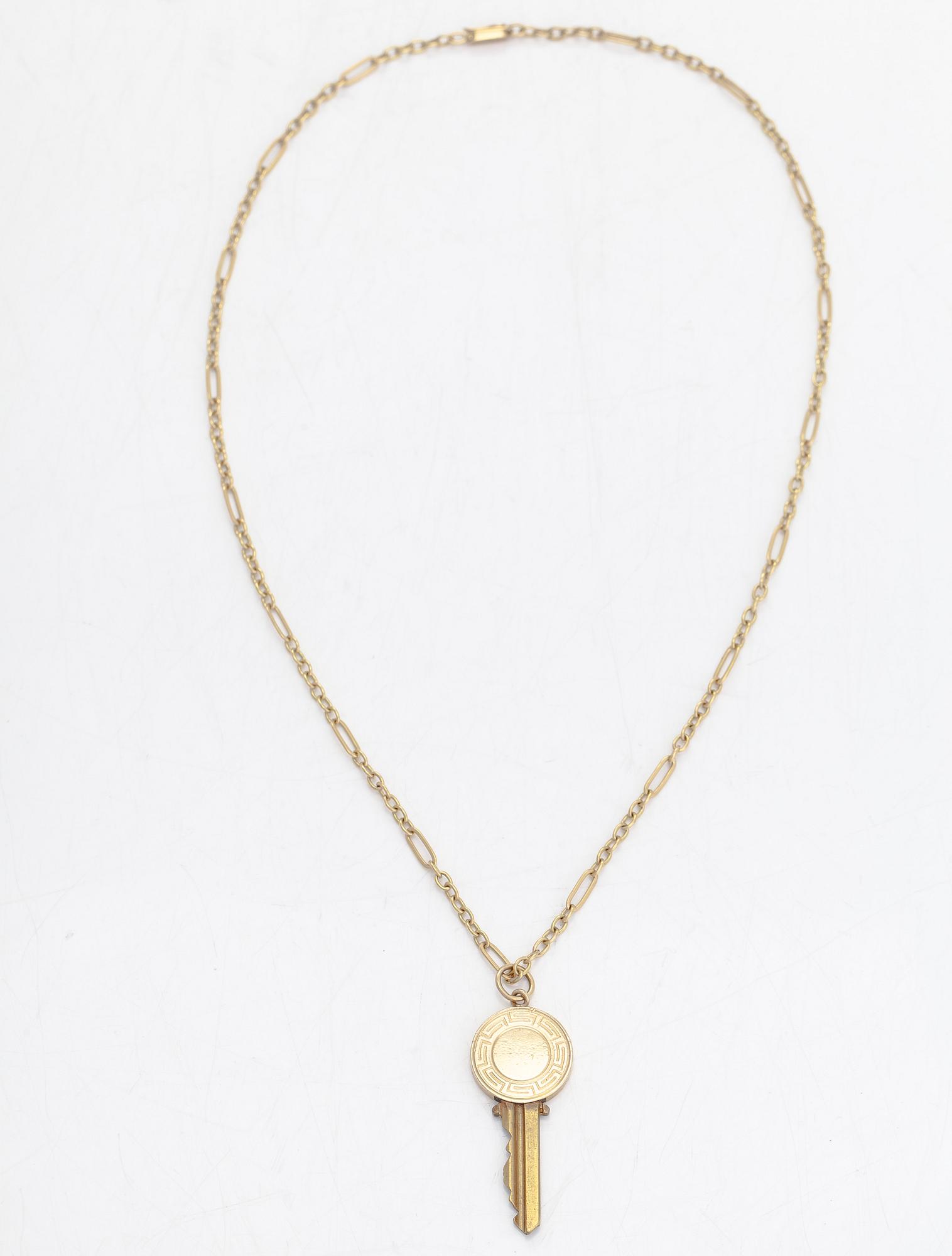 Necklace/pendant, key with monogram under a noble crown. The chain stamped Wilhelm Pettersson, Åbo 1963.