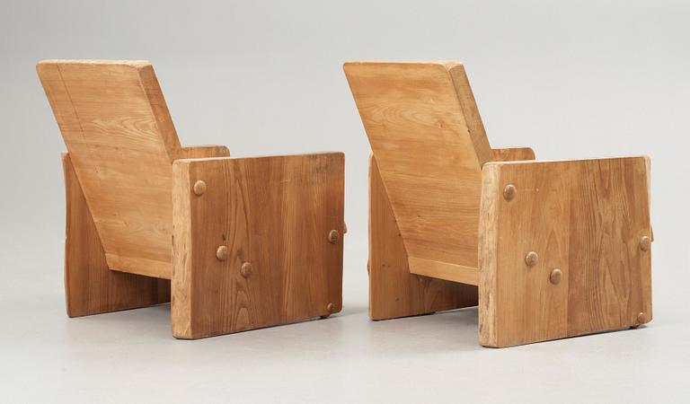 A pair of Swedish mid 20th Century armchairs, reportedly by architect Uno Liljeqvist, cabinetmaker Fritjof Nilsson.