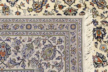 A Keshan carpet, 355 x 260 cm.