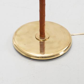 A mid 20th Century double headed floor lamp.