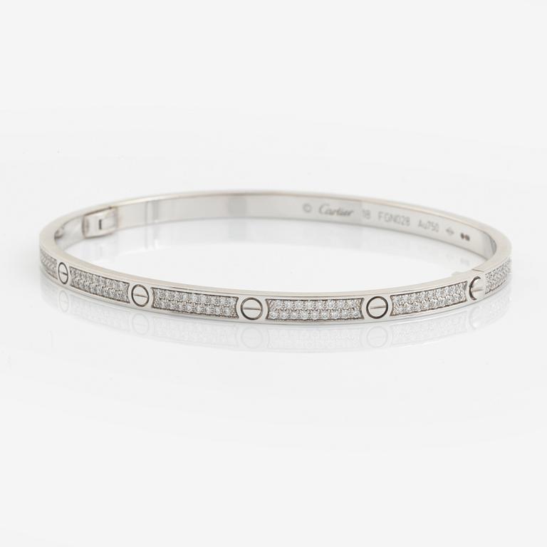 Cartier "Love" armband liten modell 18K vitguld med runda briljantslipade diamanter.
