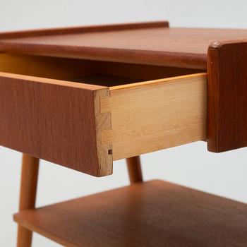 A pair of teak bedside tables, 1950's/60's.