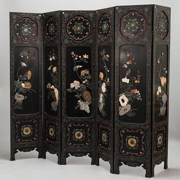 A Chinese stone decorated six-panel folding screen, first half of the 20th century.