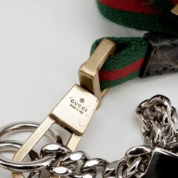 GUCCI, a dog leash.