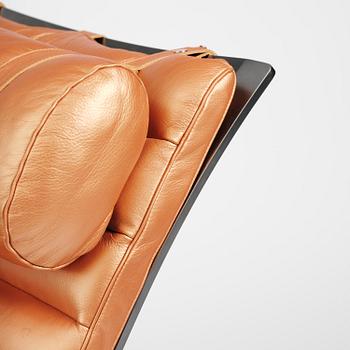 Arne Norell, an "Ari" easy chair with ottoman, Norell Möbel, Aneby, ca 2020.