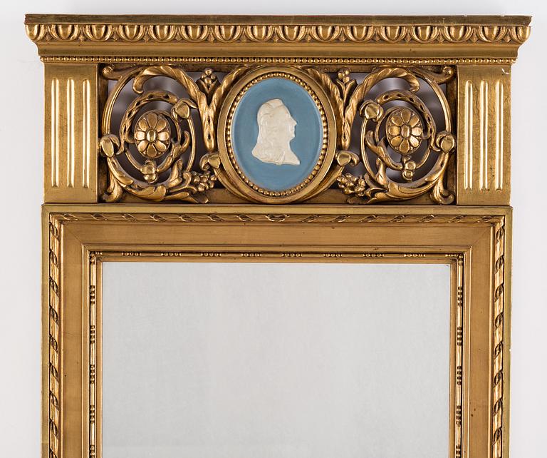 A MIRROR, gustavian style, first half of the 20th century.