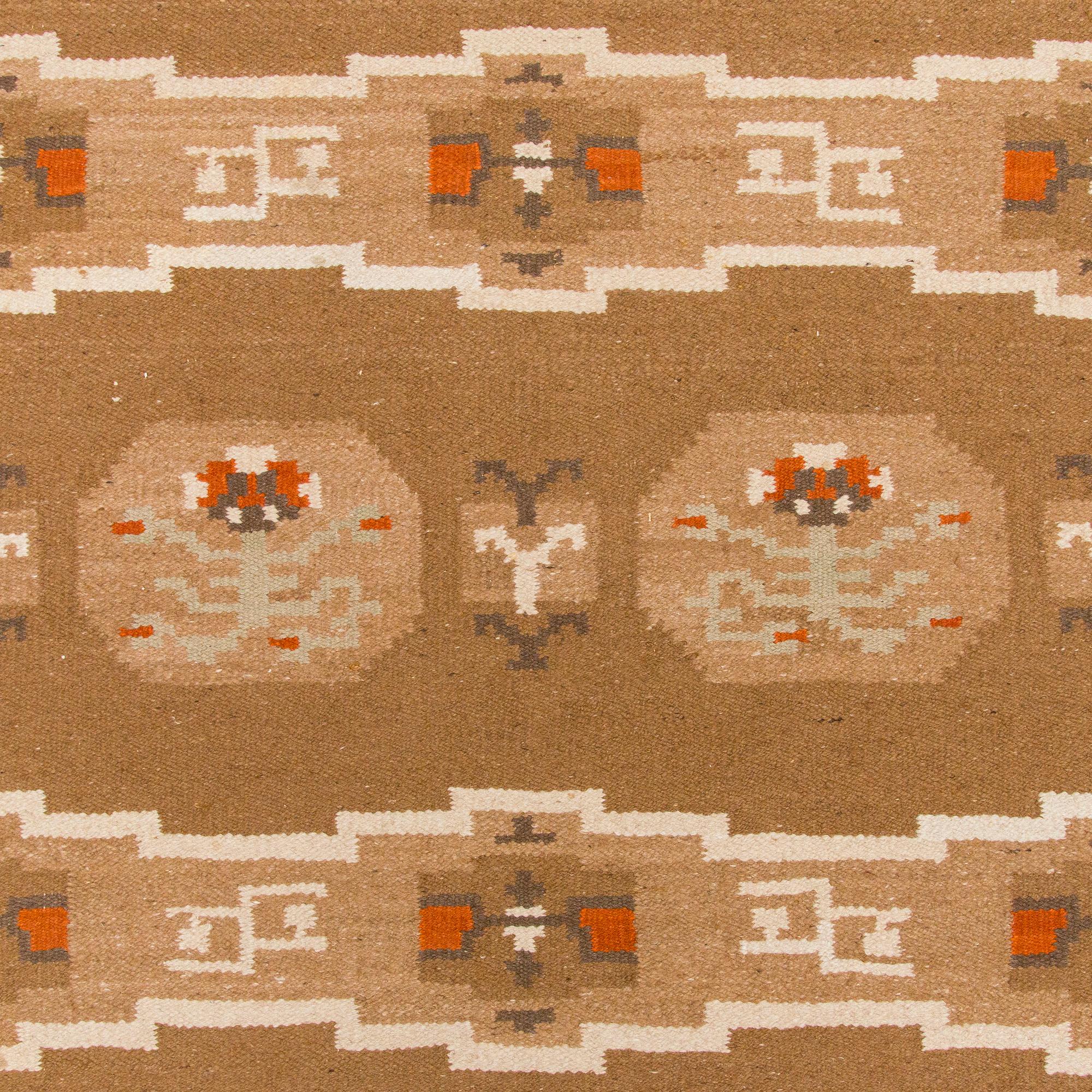 A finnish flat weave carpet 'What shall I do?', manufacturer Laura Korpikaivo-Tamminen. Circa 350 x 260 cm.