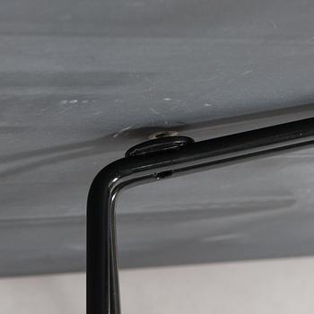Lella and Massimo Vignelli, A "Paperclip" table in slate from Knoll 1994.