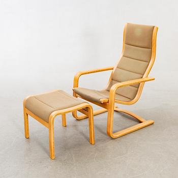 Yngve Ekström, Armchair with footstool "Lamello", Swedese, later part of the 20th century.