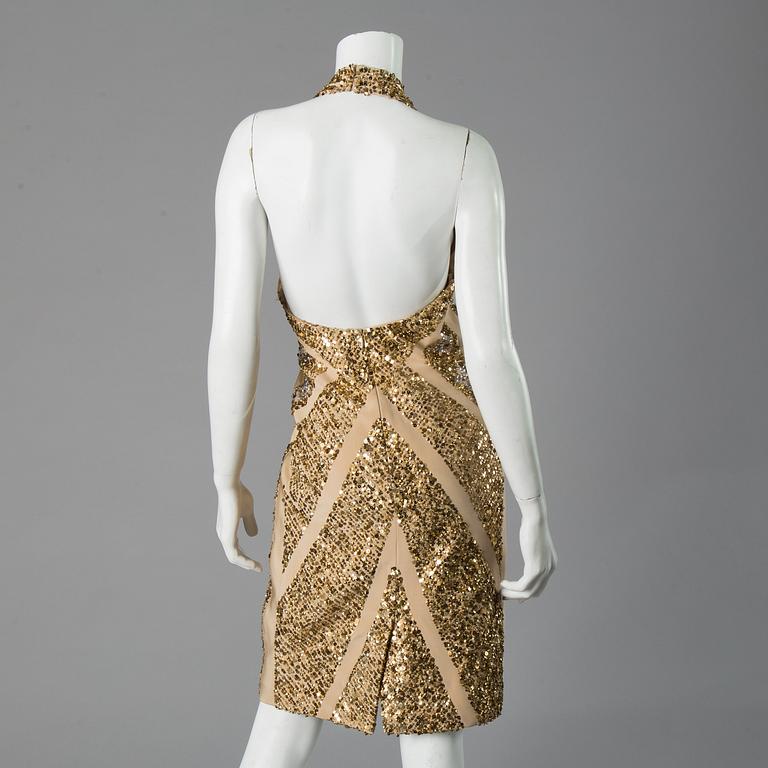 A COCTAIL DRESS, by Elie Saab.
