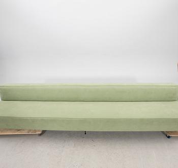 A sofa Modern Line' by Greta Magnusson Grossman, produced by Gubi, contemporary.