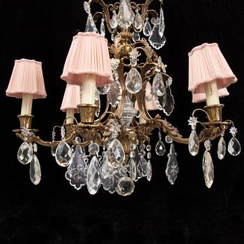 A brass and glass chandelier.
