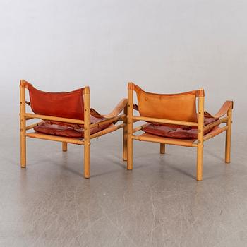 Arne Norell, a pair of Sirocco armchairs.