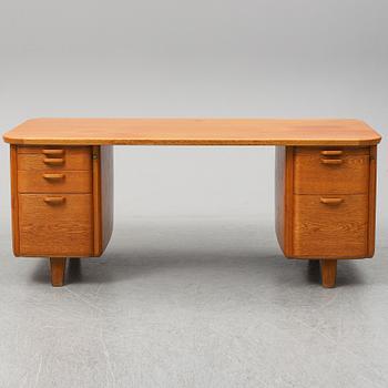 A 1950/60's oak writing desk.