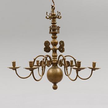 TAKKRONA, malm, 1900-talets första hälft. Höjd ca 80 cm.