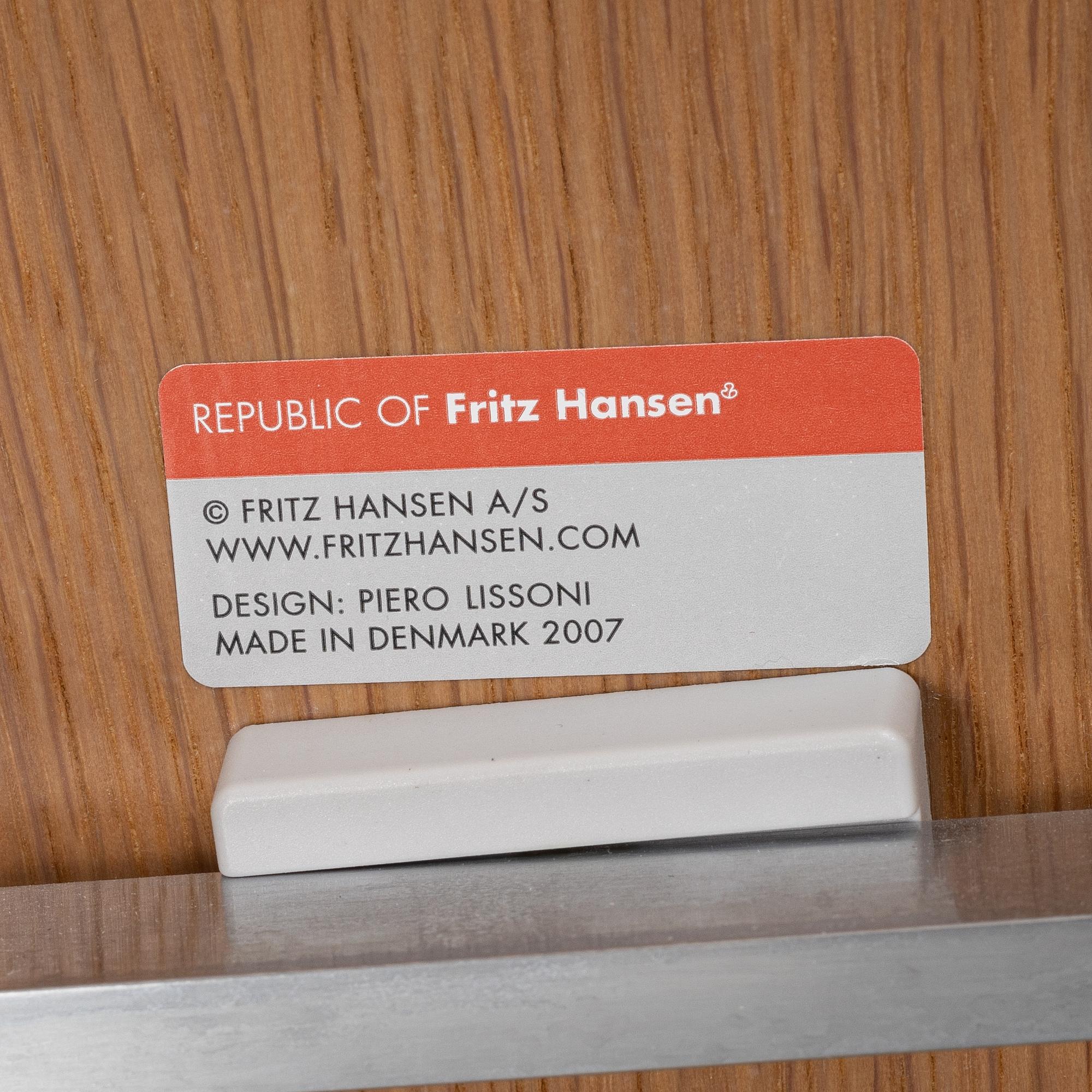 Fritz Hansen, an oak and aluminium model 'PL200' easy chair, Fritz Hansen, Denmark 2007.