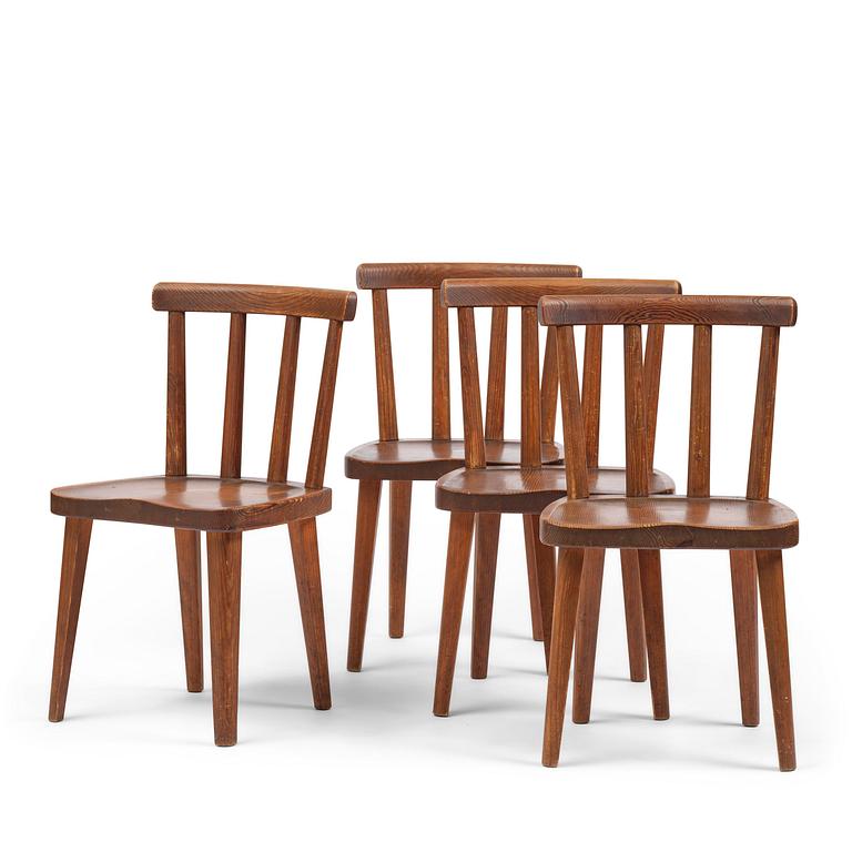 Axel Einar Hjorth, a set of four stained pine "Utö" chairs, Nordiska Kompaniet, Sweden, 1930s.