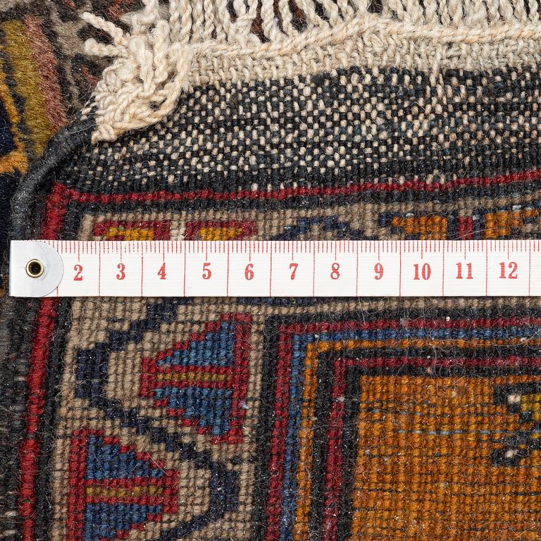 An Anatolian prayer rug, semi-antique, c. 205 x 115 cm.