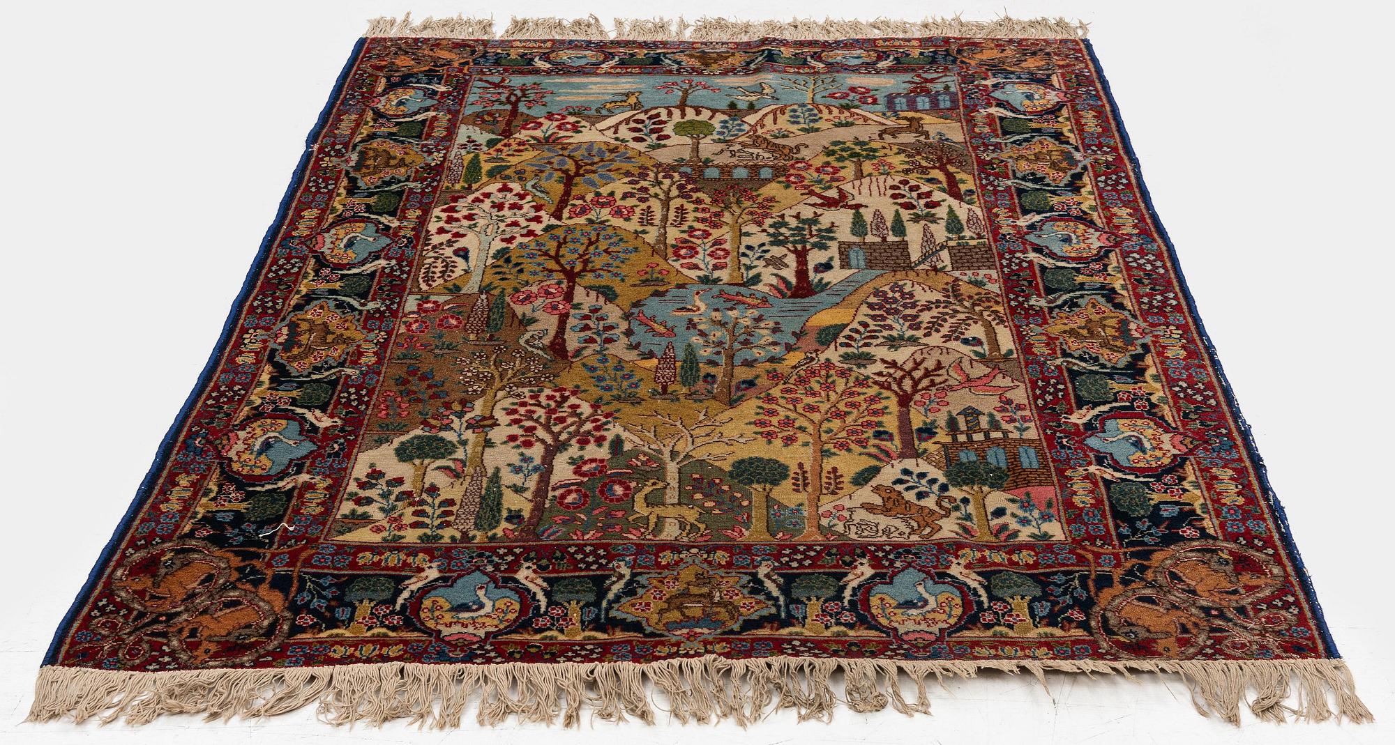 A semi-antique pictoral Tabriz rug, West Persia, c. 193 x 130 cm.