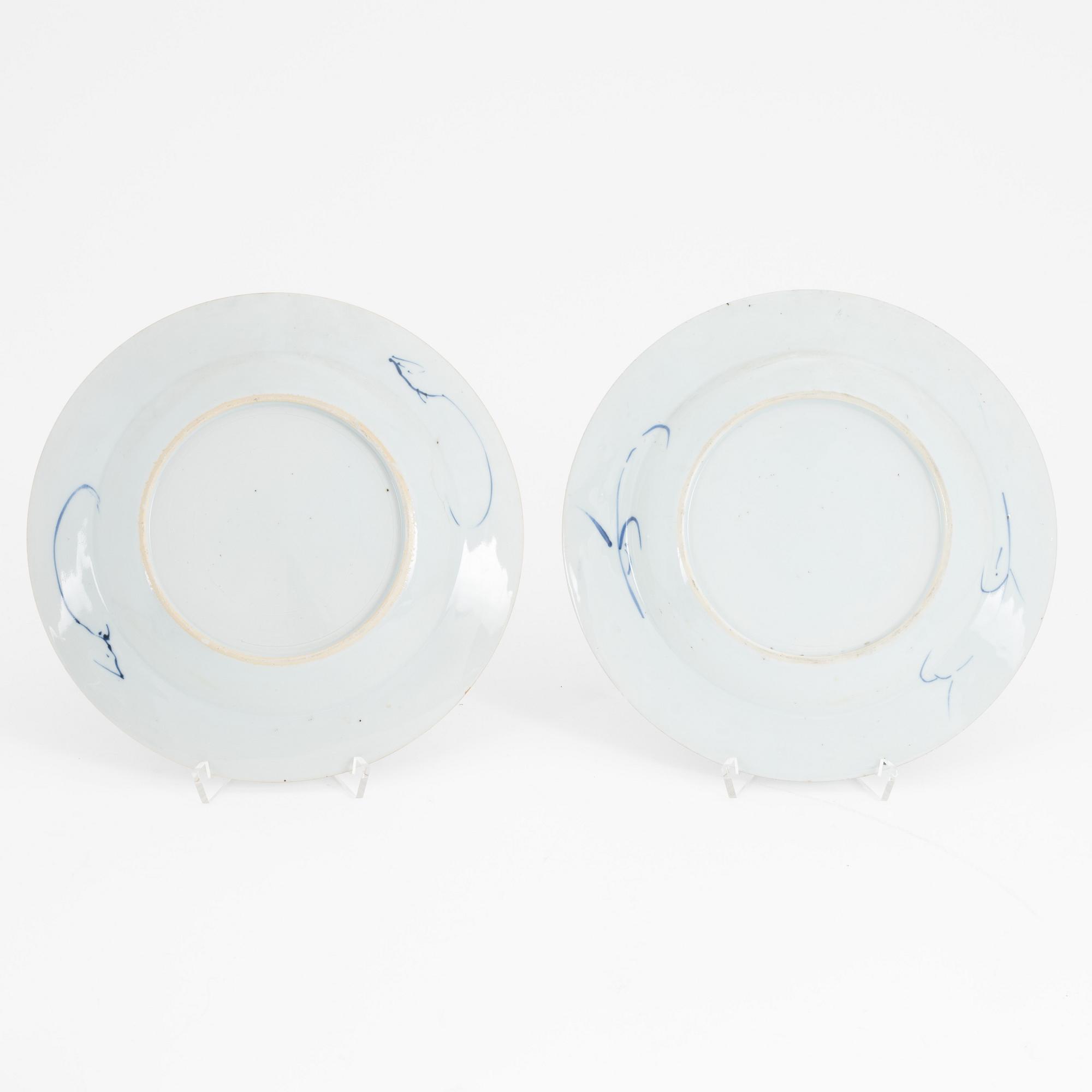A group of Chinese blue and white porcelain: dish, vase, three cups and two plates. 18th and 20th century.