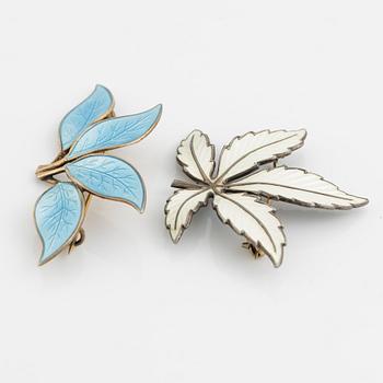 Two silver and enamel brooches, one by David Andersen, Norway.