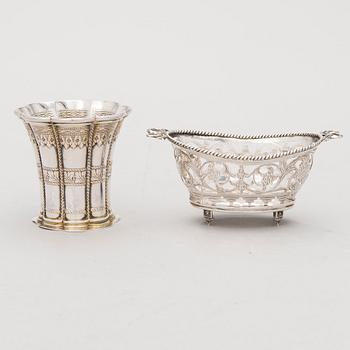 Four silver objects from the 20th Century.