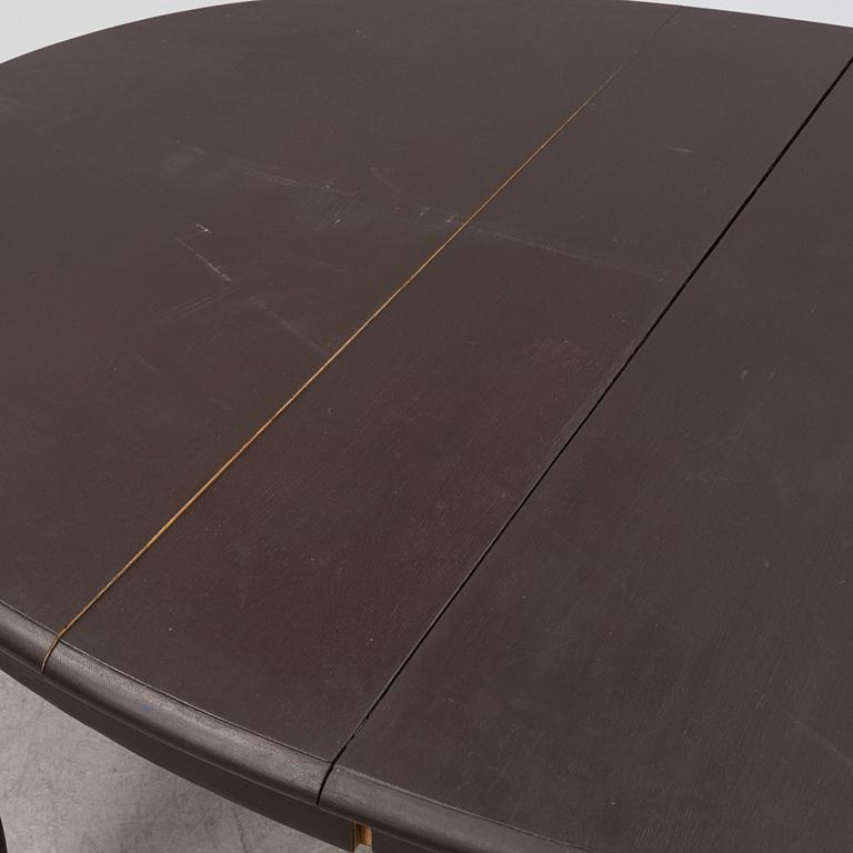 A painted  late Baroque style dining table, early 20th Century.