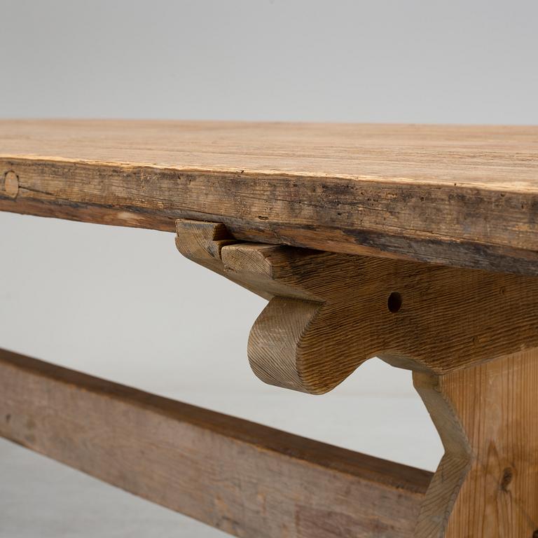 A 20th century pine table.