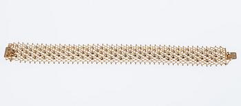ARMSMYCKE, 18K guld. 1900-talets senare hälft. Vikt 19,3 g.