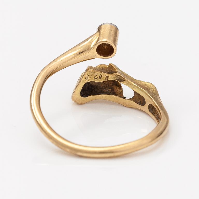 Björn Weckström, An 18K gold ring "Diamond well" with a diamond ca. 0.02 ct. Lapponia.
