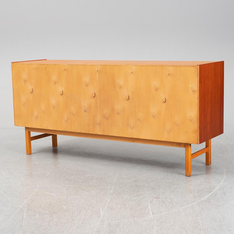 A second half of the 20th century teak veneered sideboard.