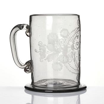 A large tankard, 18th Century with eched monogram for 'G.R.G' and 'M.E.W.' 1781.