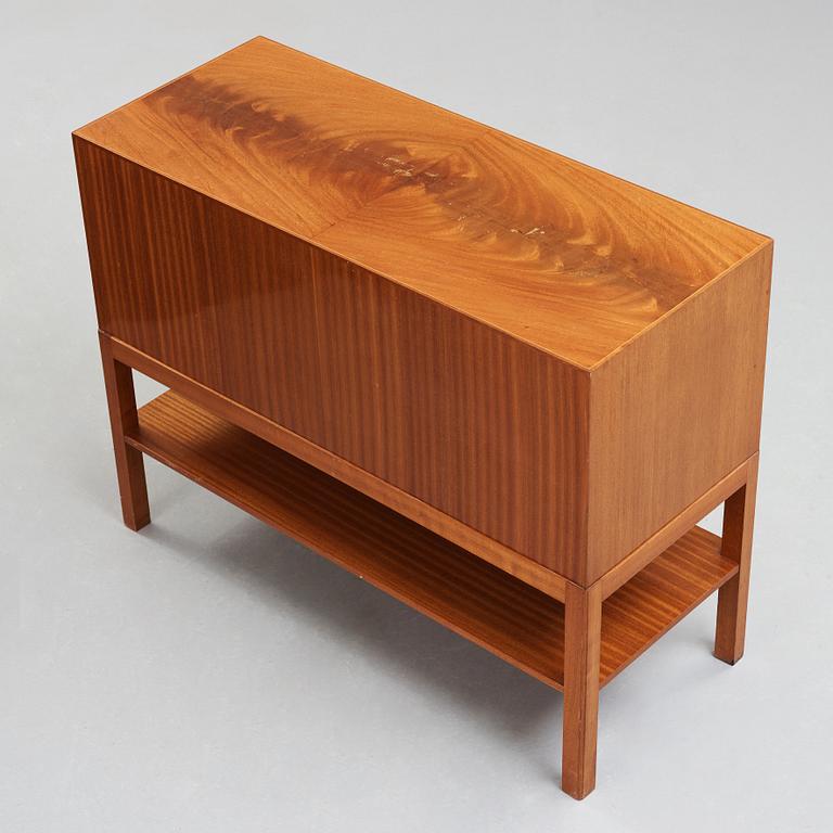 Josef Frank, a mahogany chest of drawers, by Svenskt Tenn Sweden, probably 1950's.