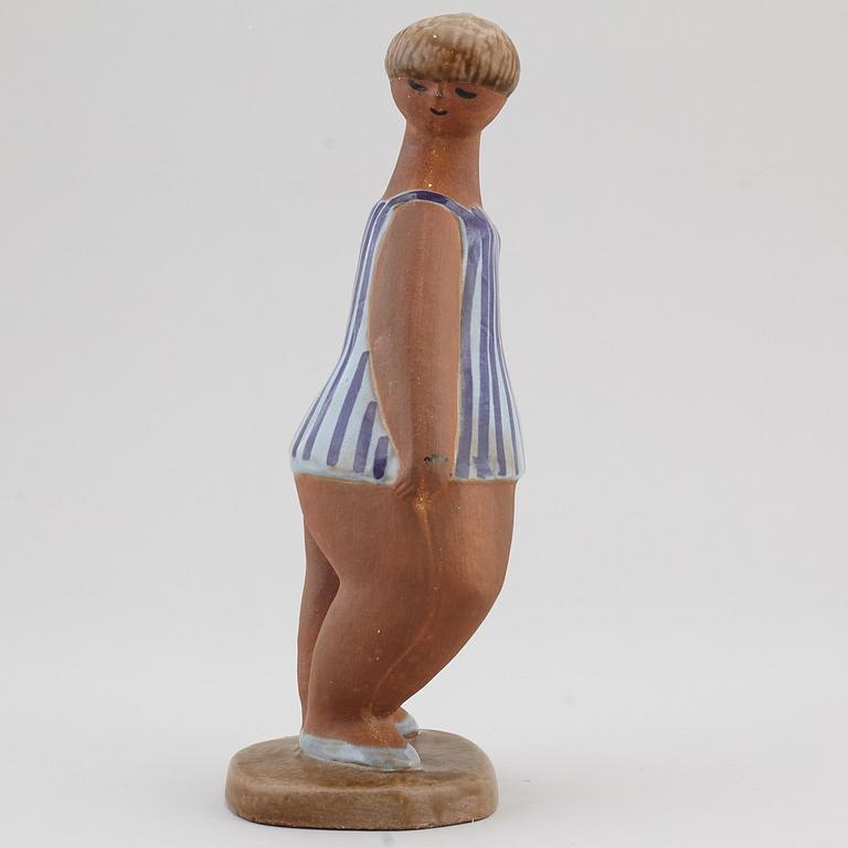 LISA LARSON, a 'Dora' stoneware figurine, from ABC-Flickorna, Gustavsberg.