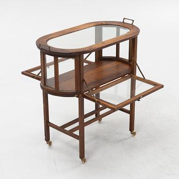 An oak tea trolley, early 20th Century.