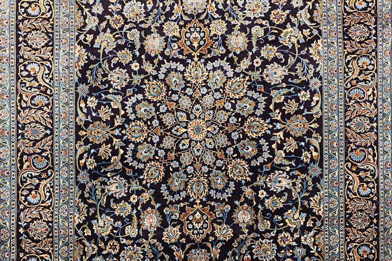 A Keshan carpet, c. 350 x 250 cm.