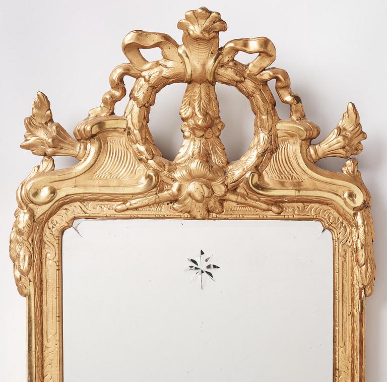 A rococo giltwood two-branch girandole by J. Åkerblad (master in Stockholm 1756-99).