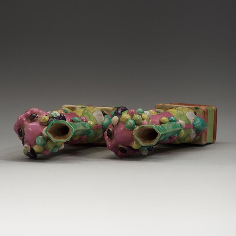 A pair of famille rose joss stick holders, Qing dynasty, 19th Century.