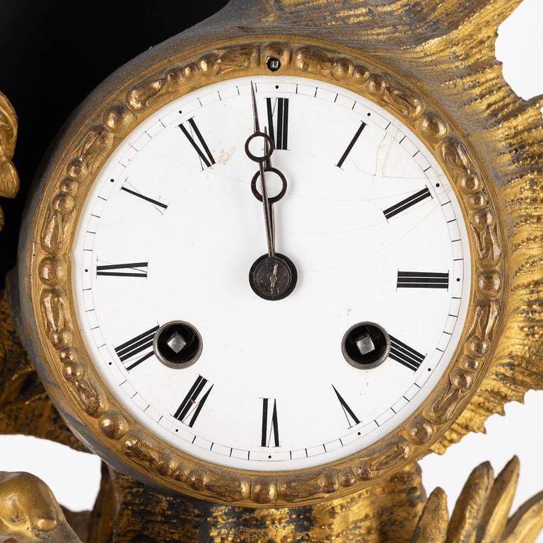 A Louis XVI-style gilt zink and marble mantel clock, later part of the 19th Century.