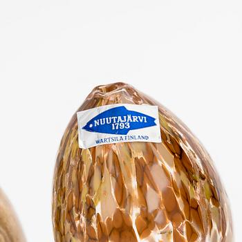 A set of 10 glass and stone decorative eggs.