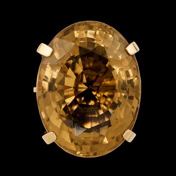 103. A 90.00 cts citrine cocktail ring.