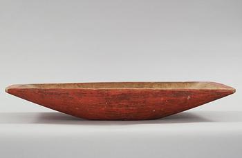A wooden bowl from the 19th century.