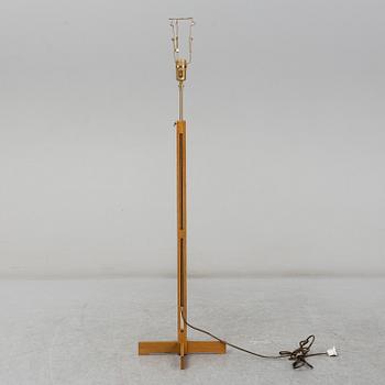 A 1960's teak floor lamp by Hans Kempe & Lars Ljunglöf.