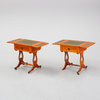 A pair of side tables width drop leaves from Schelco, end of the 20th Century.