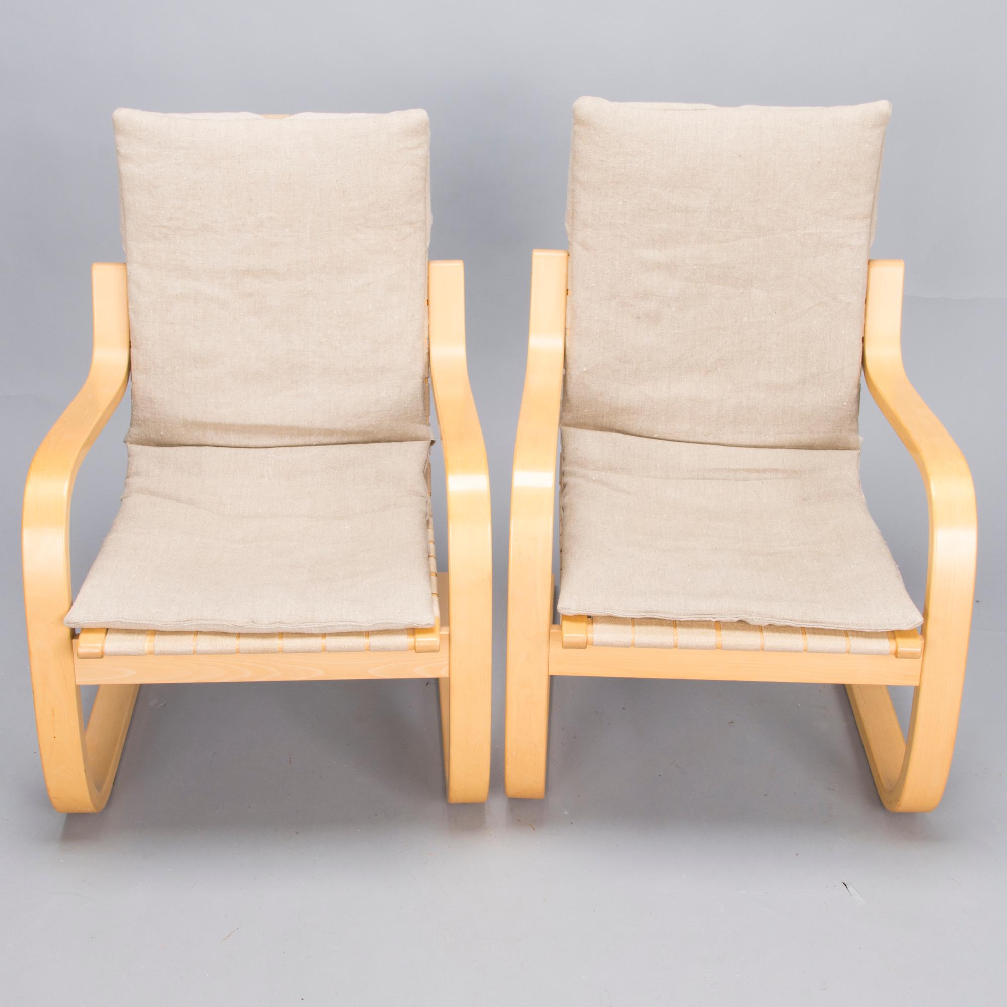 ALVAR AALTO, Pair of model '406' armchairs for Artek, late 20th century .