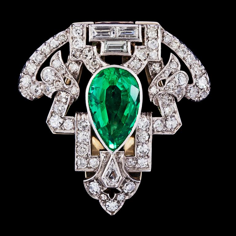 An Art Deco Columbian emerald and diamond clip, app 4 cts, resp, tot. app. 1.50 cts. 1930's.